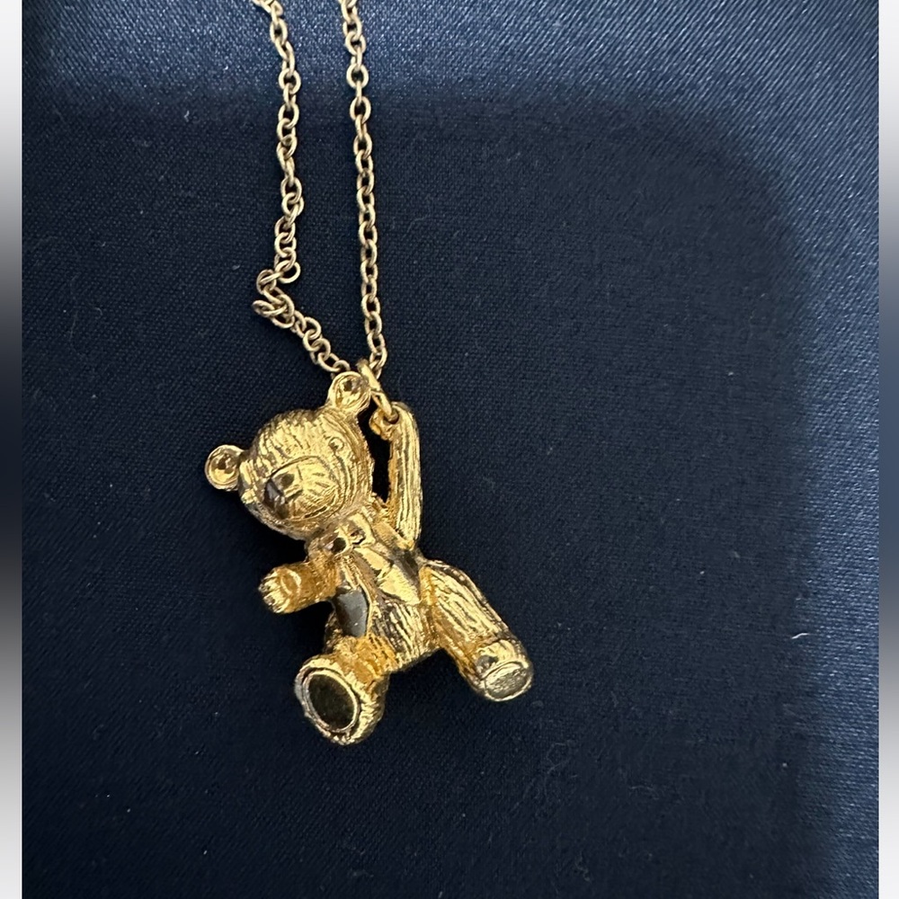 Adorable Teddy Bear necklace. Chain is approximately 18 inches.